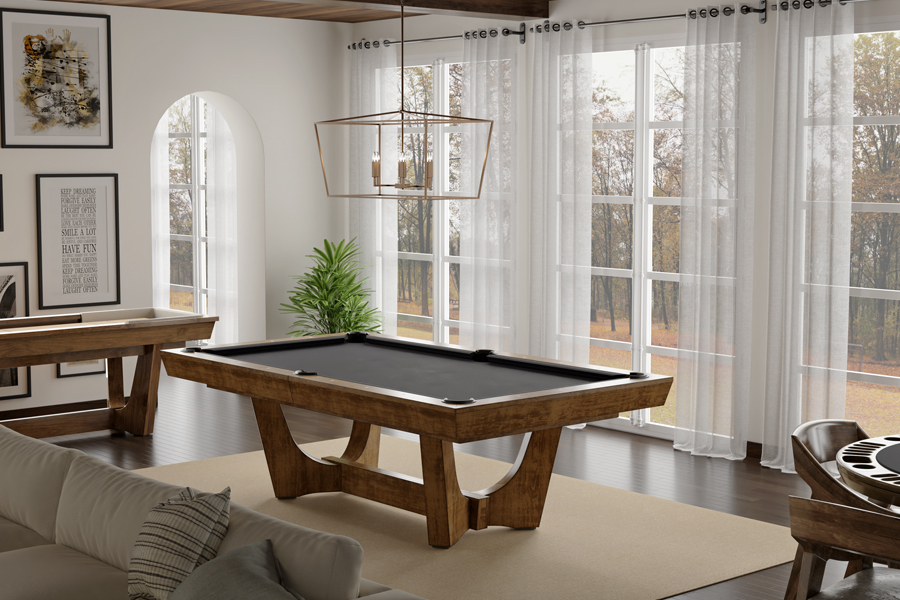 California House Menlo pool table beneath a pendant light in a games room with sheer curtains