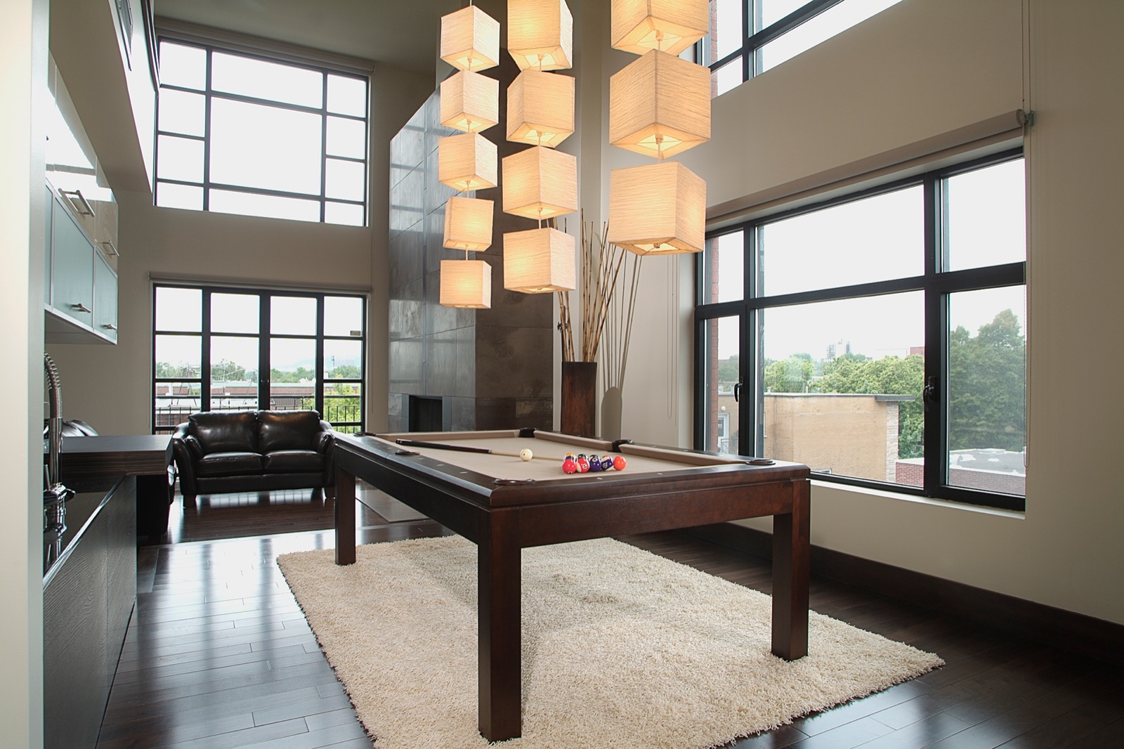 Pool table in a contemporary home game room.