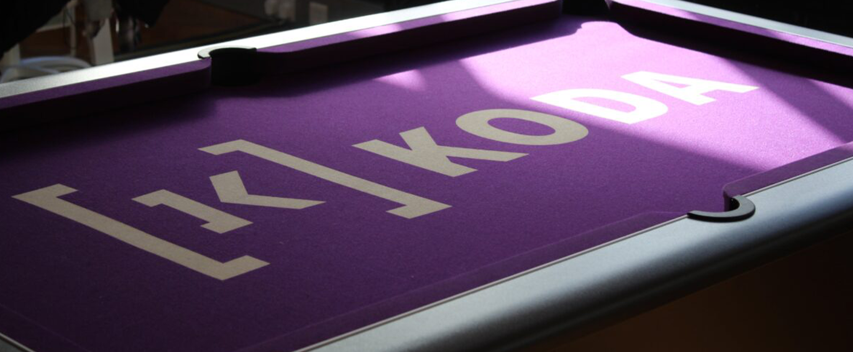 Hainsworth printed purple pool table cloth with a custom design