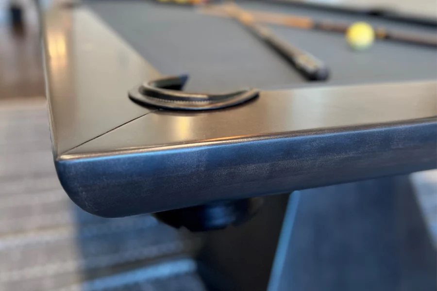 Cypress rail and semi-exposed leather pocket detail