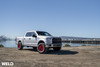 Weld Off-Road W905 17X9 Cinch Beadlock 6X135 6X139.7 ET-12 BS4.50 Candy Red / Red Ring 106.1 Wheel | 2009-2024 F-150 | 2010-2024 Raptor | 2010-2024 Expedition | 2019-2024 Ram 1500 | Silverado / Sierra 1500 | W90579098450