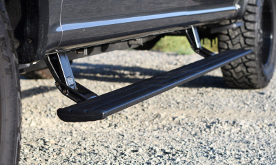 AMP Research PowerStep Smart Series (86135-01A) for 2020–2025 Jeep Gladiator. Bluetooth app control, automatic deploy/retract, LED lighting, and rugged all-weather design.