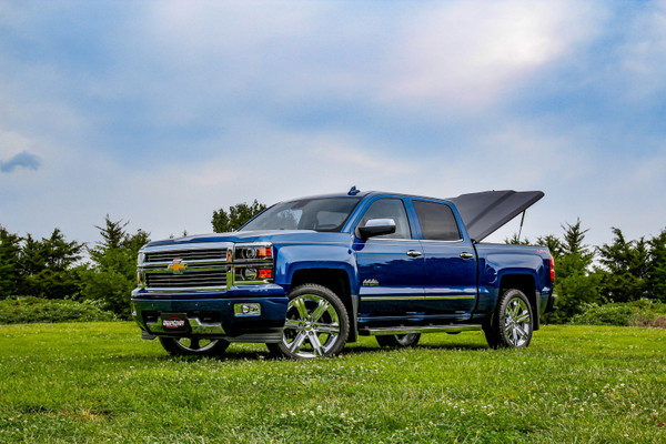 Undercover LUX Hard Folding Tonneau Cover, Aluminum Panels for 2019-2026 Silverado / Sierra 1500 (w/ MultiPro TG) 6.5ft - Black Textured - Part #UC1218