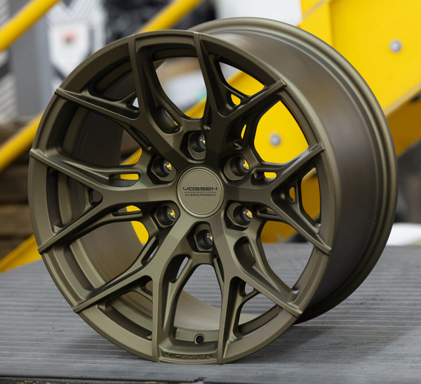 Upgrade your Silverado & Sierra 1500, Bronco GEN 6, Tacoma, Tundra, 4Runner, Sequoia, or Lexus GX with the Vossen HF6-4 17X9 6X139.7 ET0 106.1 Deep Face - Terra Bronze Wheel (HF64-7G74). Experience enhanced performance and sleek design. Available now at Just Bolt-Ons.