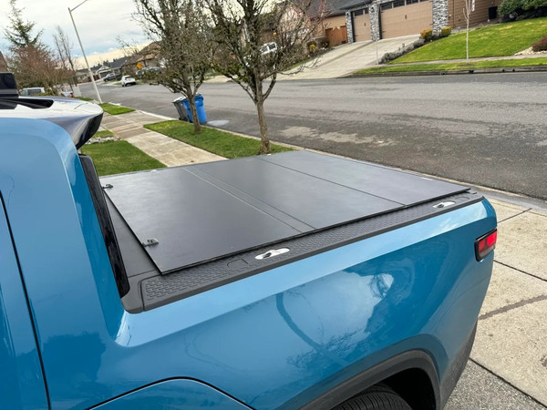 Access LOMAX Tri-Fold Cover - Matte Black - 2022-2025 Rivian R1T 4ft 6in Bed (w/ OEM Tonneau Track) - B1080019