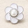 white enamel flower snap jewelry charm with silver edges and a central pearl surrounded by small silver beads