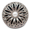 round snap jewelry charm with a vintage flower design featuring silver petals, clear rhinestones around the edge, and a white pearl center