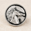 silver-toned snap jewelry charm with a raised detailed horse head profile and textured rope-like border on a neutral background