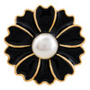 black enamel flower snap jewelry charm with gold trim and a white pearl center
