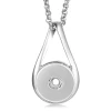 Silver SnapAccents snap jewelry pendant necklace with circular snap charm holder on textured beige fabric background, modern minimalist accessory for interchangeable snap buttons.