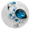silver snap jewelry charm shaped like a flamingo with a large blue teardrop rhinestone body and smaller blue, light blue, and clear rhinestones forming the neck and head