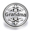 Silver SnapAccents round snap jewelry charm with "Grandma" text, decorative fleur-de-lis design, and clear rhinestone accents, perfect for personalized snap bracelets, necklaces, or accessories gift for grandmothers.