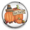SnapAccents snap jewelry featuring a Thanksgiving-themed design with two orange pumpkins, one wearing a pilgrim hat, surrounded by autumn leaves and acorns, and a wooden sign that reads "Give Thanks," perfect for fall and holiday accessories.
