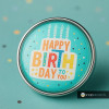 SnapAccents birthday snap jewelry charm with colorful "Happy Birthday to You" text and four candles on turquoise background, round silver metal frame, festive confetti design, interchangeable snap accessory for bracelets and necklaces, perfect birthday gift or celebration accessory.