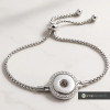 Silver adjustable snap bracelet with clear rhinestone circle charm, elegant chain link design, interchangeable snap jewelry accessory by SnapAccents, stylish gift for women, customizable fashion bracelet.