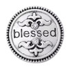 Silver-tone round snap jewelry charm with the word blessed, two clear rhinestones, and decorative scroll designs