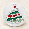 Round silver snap jewelry charm featuring a Christmas tree design with green enamel and red, white, and light green rhinestones