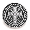 Round silver SnapAccents snap jewelry charm featuring a decorative cross design embellished with clear rhinestones, surrounded by intricate scrollwork and a twisted rope border, perfect for interchangeable snap bracelets, necklaces, and accessories.