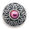 Round SnapAccents snap jewelry charm with intricate silver filigree design and central glossy pink pearl accent, perfect for interchangeable snap bracelets and necklaces.