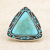 Triangular snap jewelry charm with a large turquoise stone center and surrounding turquoise rhinestones in a silver-tone setting