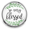 Round SnapAccents snap jewelry charm with "so very blessed" text in elegant script, surrounded by green leafy accents, silver metal frame, inspirational accessory for bracelets or necklaces.