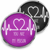 SnapAccents snap jewelry buttons with heartbeat and heart design, featuring the phrase "You Are My Person" in white text on purple and black backgrounds, perfect for personalized charm accessories, gift ideas, and meaningful keepsakes.