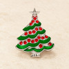 Christmas tree snap jewelry charm with green enamel branches, red rhinestone decorations, and a silver-tone star on top