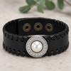 black leather snap jewelry bracelet with a central white pearl snap charm surrounded by clear rhinestones