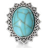 snap jewelry charm with an oval turquoise stone center and an ornate silver-toned border featuring intricate heart-shaped patterns