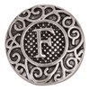 Antique silver snap charm with intricate scrollwork design featuring a raised letter "F" in the center, textured background, round shape, interchangeable snap jewelry accessory for bracelets and necklaces.