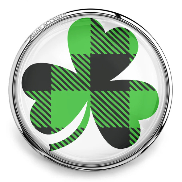 SnapAccents snap jewelry charm featuring a green and black plaid patterned shamrock clover design, perfect for St. Patrick's Day accessories, interchangeable snap jewelry, and festive fashion statements.
