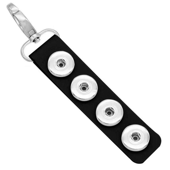 Black leather SnapAccents snap jewelry keychain with four silver snap button bases and a silver lobster clasp, customizable accessory for interchangeable snap charms.