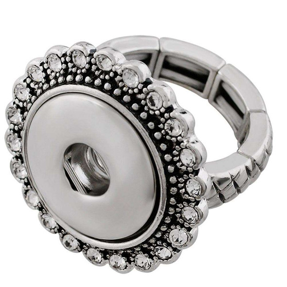 Adjustable silver-tone snap button ring with clear rhinestone accents, designed for interchangeable SnapAccents snap jewelry pieces, featuring a decorative scalloped edge and flexible band for comfortable fit.