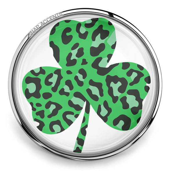 Green shamrock snap charm with black leopard print pattern, silver metal frame, SnapAccents interchangeable jewelry accessory, St. Patrick’s Day themed snap button for bracelets and necklaces.
