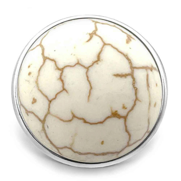 round snap jewelry charm with smooth cream surface and brown veining resembling natural howlite stone