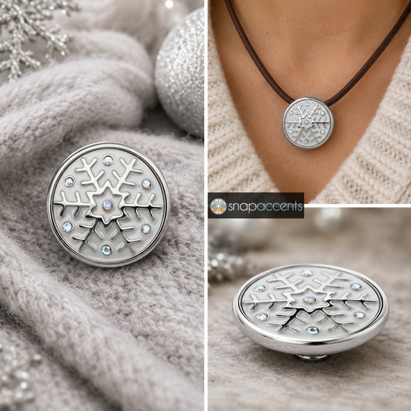 round snap jewelry charm with white enamel and silver snowflake design accented by iridescent AB crystals, shown loose and worn on a brown leather necklace