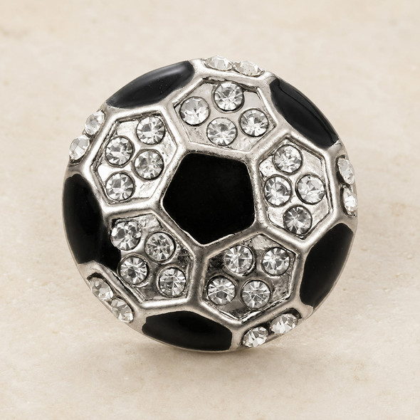 round snap jewelry charm designed like a soccer ball with black enamel pentagons and clear rhinestones in silver-tone settings