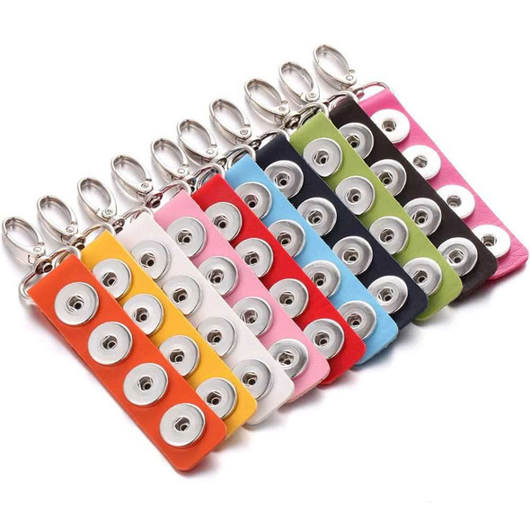 Colorful SnapAccents snap jewelry keychains with metal lobster clasps, featuring multiple snap button slots for interchangeable decorative snaps, available in orange, yellow, white, pink, red, blue, navy, green, black, and hot pink. Perfect for customizable accessories, gifts, and craft projects.