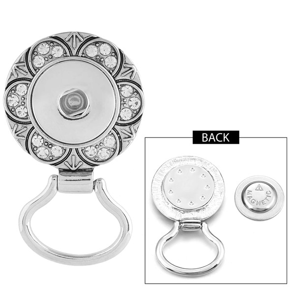 Silver SnapAccents snap jewelry pendant with clear rhinestone accents, decorative floral design, magnetic snap back, and attached loop for necklaces or bracelets, shown front and back views on white background.