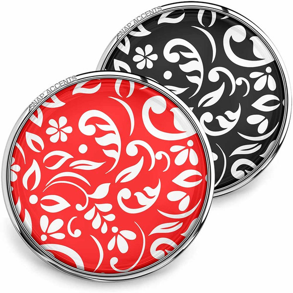 SnapAccents snap jewelry buttons featuring elegant white floral and swirl patterns on vibrant red and black backgrounds, round interchangeable snap charms with polished silver-tone metal edges, perfect for customizable bracelets, necklaces, and accessories.