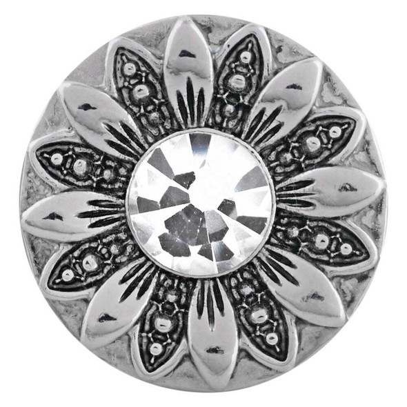 Silver SnapAccents snap jewelry charm with intricate floral petal design and large clear faceted crystal center, vintage-inspired decorative accessory for interchangeable snap bracelets, necklaces, and fashion jewelry.