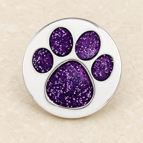 silver-tone snap jewelry charm with a purple glitter paw print design featuring one large pad and four smaller pads