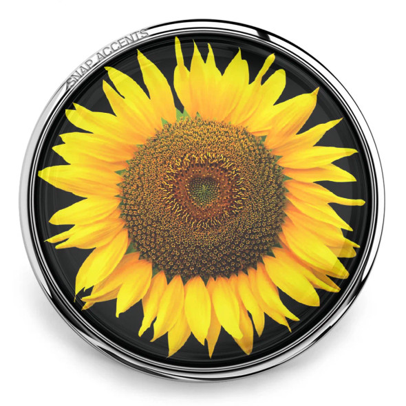 SnapAccents snap jewelry featuring a vibrant yellow sunflower design with detailed petals and textured center, set in a shiny silver-tone round frame, perfect for interchangeable snap charm bracelets, necklaces, and accessories.