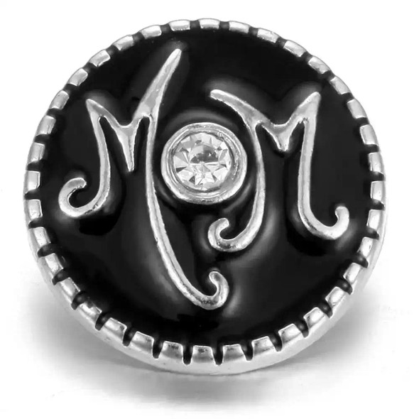 Black and silver SnapAccents snap charm with decorative "MOM" lettering and a central clear rhinestone, perfect for customizable jewelry accessories.