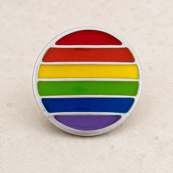 round snap jewelry charm with horizontal enamel stripes in red, orange, yellow, green, blue, and purple separated by silver lines