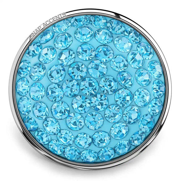 SnapAccents round snap jewelry charm with sparkling light blue crystals set in silver-tone metal, interchangeable decorative accessory for bracelets and necklaces, elegant and vibrant fashion statement piece.
