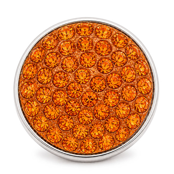 round snap jewelry charm covered in bright orange rhinestones with a silver metal edge