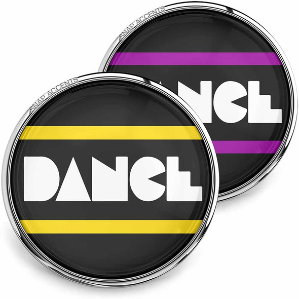 SnapAccents round snap jewelry buttons with bold white "DANCE" text on black background, accented by yellow and purple horizontal stripes, silver metal edges, interchangeable fashion accessories for bracelets or necklaces.