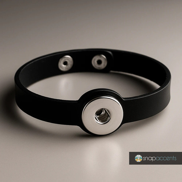 Black adjustable snap bracelet with silver-tone snap button base, customizable interchangeable jewelry accessory by SnapAccents, modern minimalist unisex wristband for personalized fashion style.