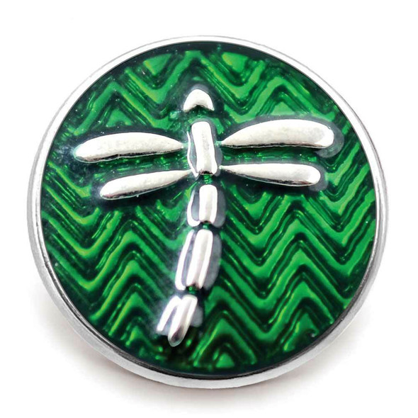 green snap jewelry charm with silver dragonfly over textured chevron background